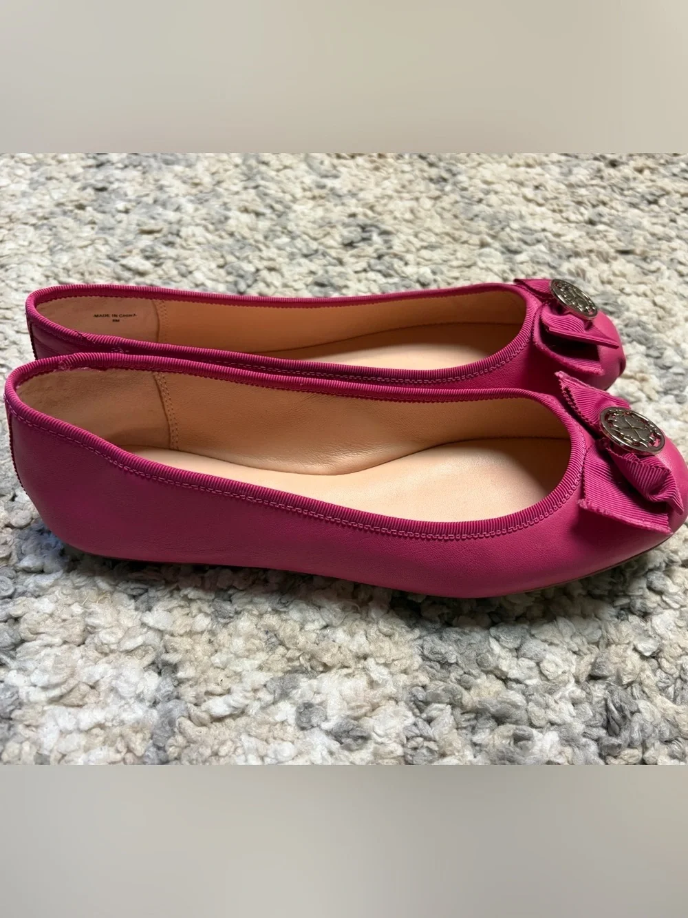 kate spade fuchsia bow ballet flats with logo medallion